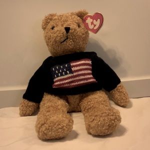 Adorable Ty “Curly” plush bear wearing a navy blue sweater with a USA 🇺🇸 flag